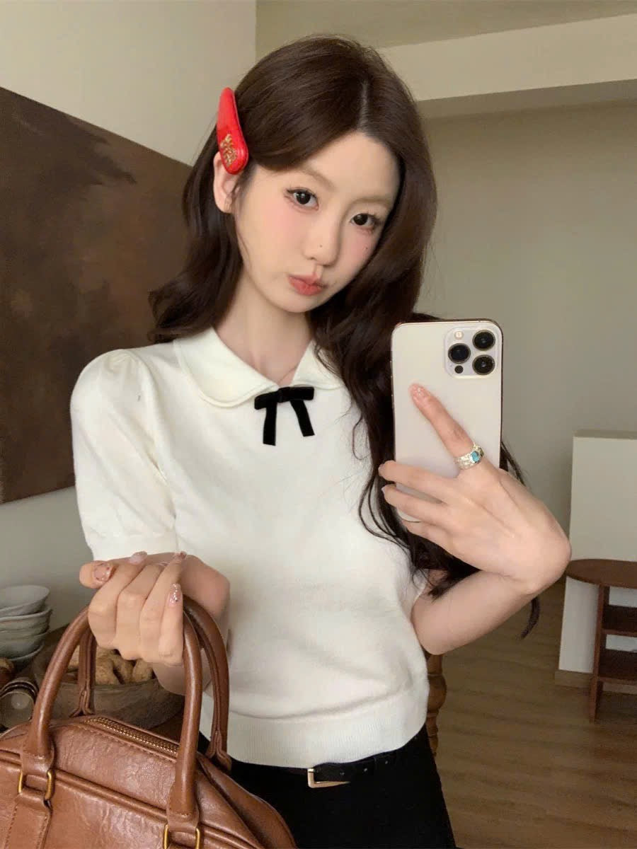 Áo polo đính nơ tiểu thư