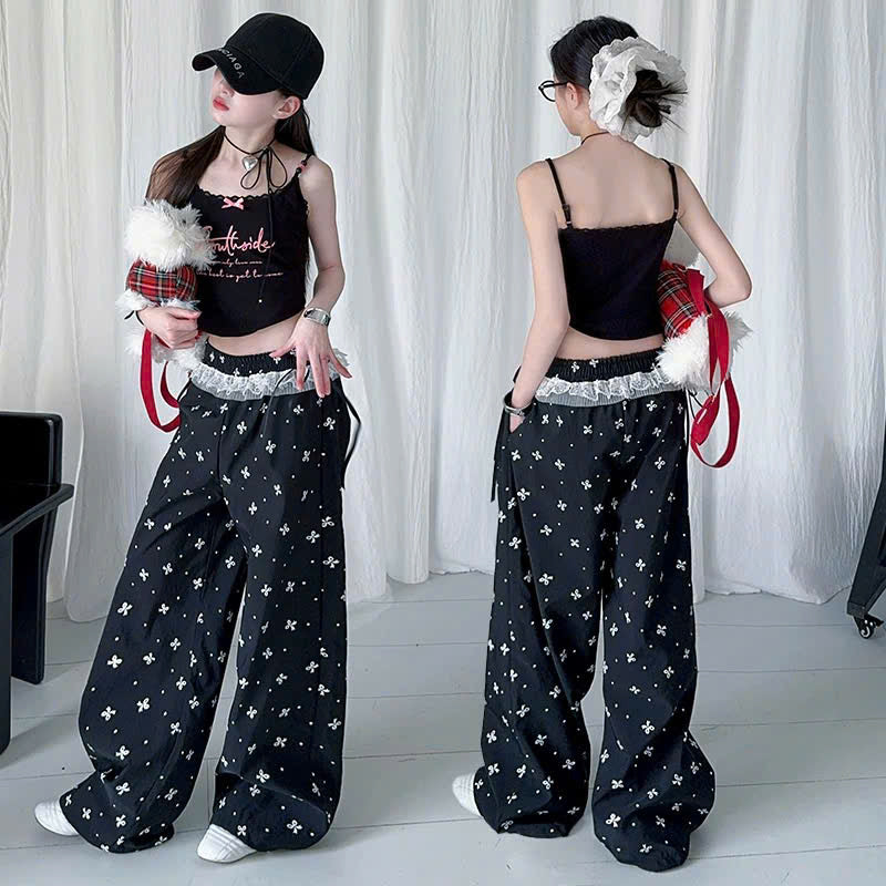 Áo 2 dây đen nơ xinh phối quần ống rộng viền ren