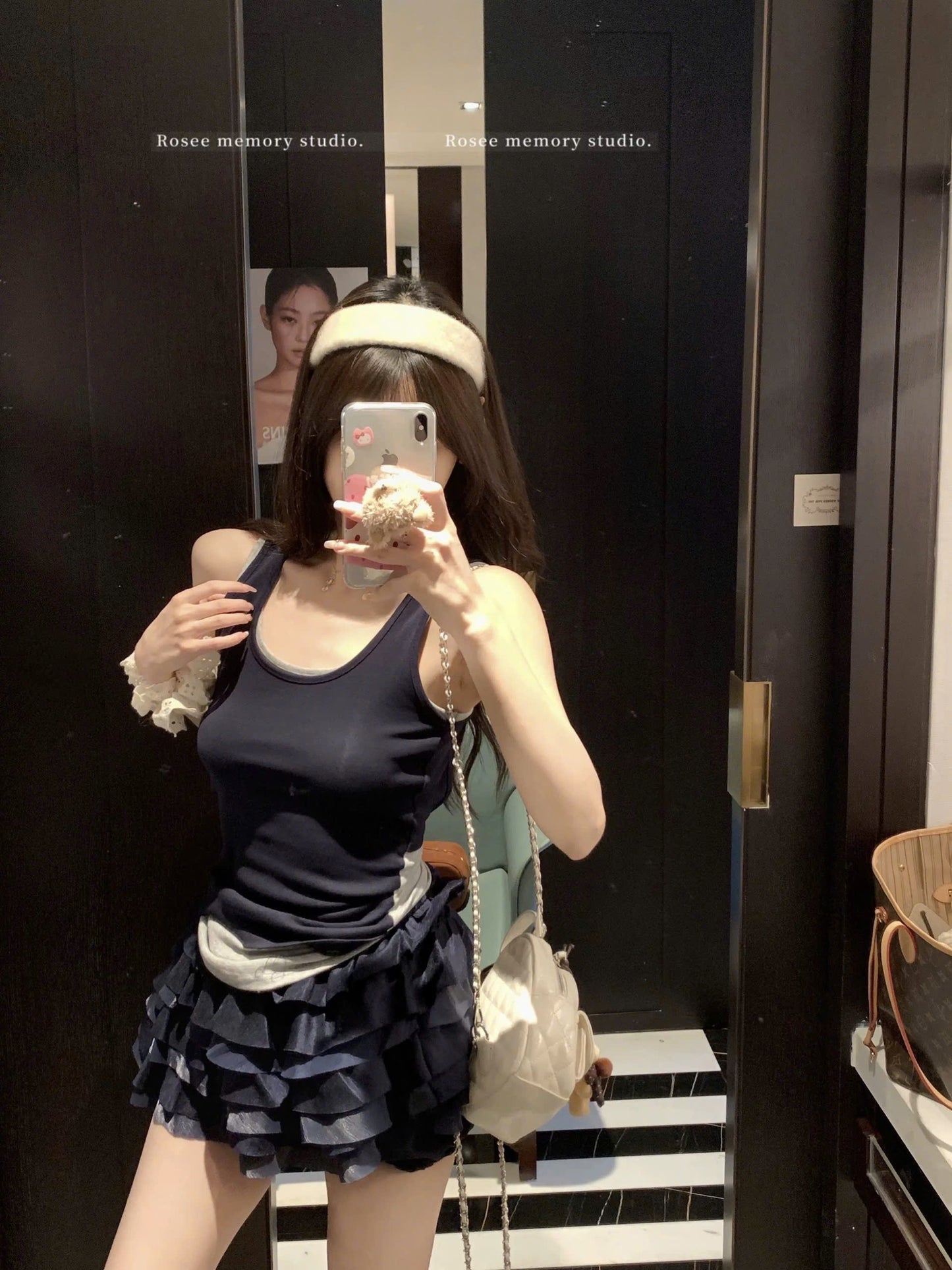 Set áo ba lỗ cột nơ lưng và chân váy tầng