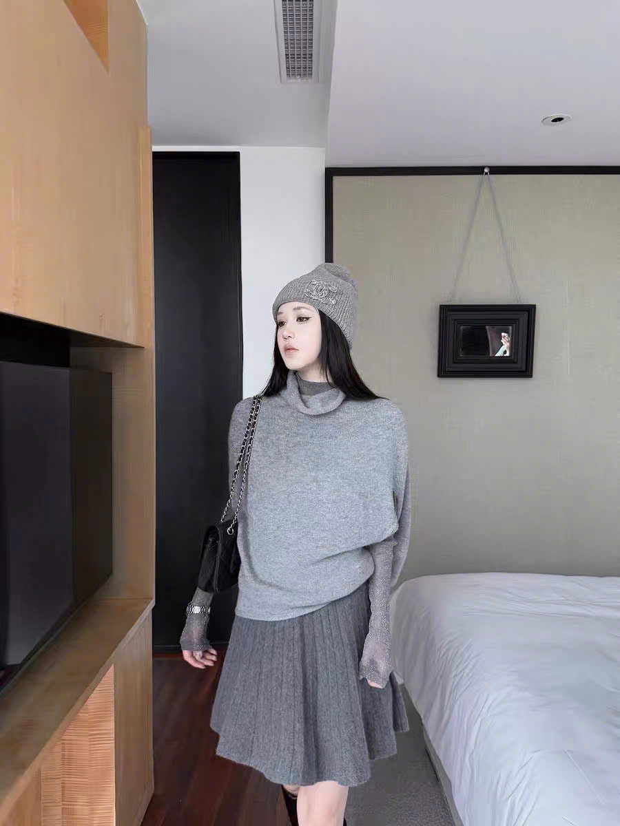 Áo len dệt kim cổ lọ không tay