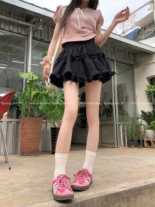 Chân váy xếp ly viền bèo ren