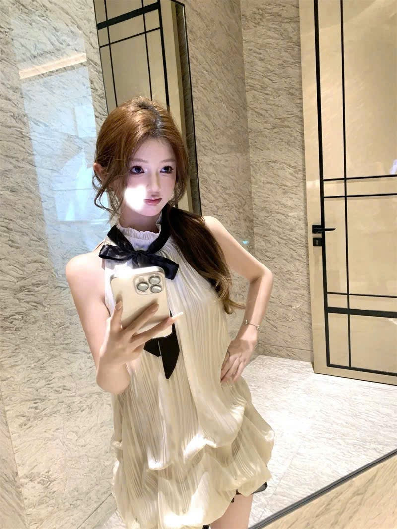 Váy yếm cột nơ tiểu thư