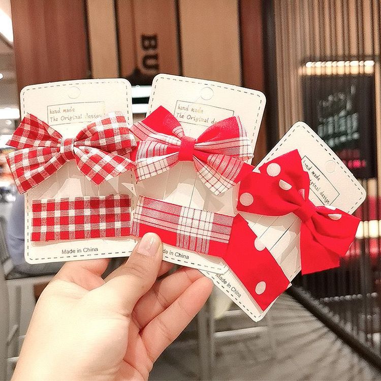 Kẹp nơ cho bé màu đỏ