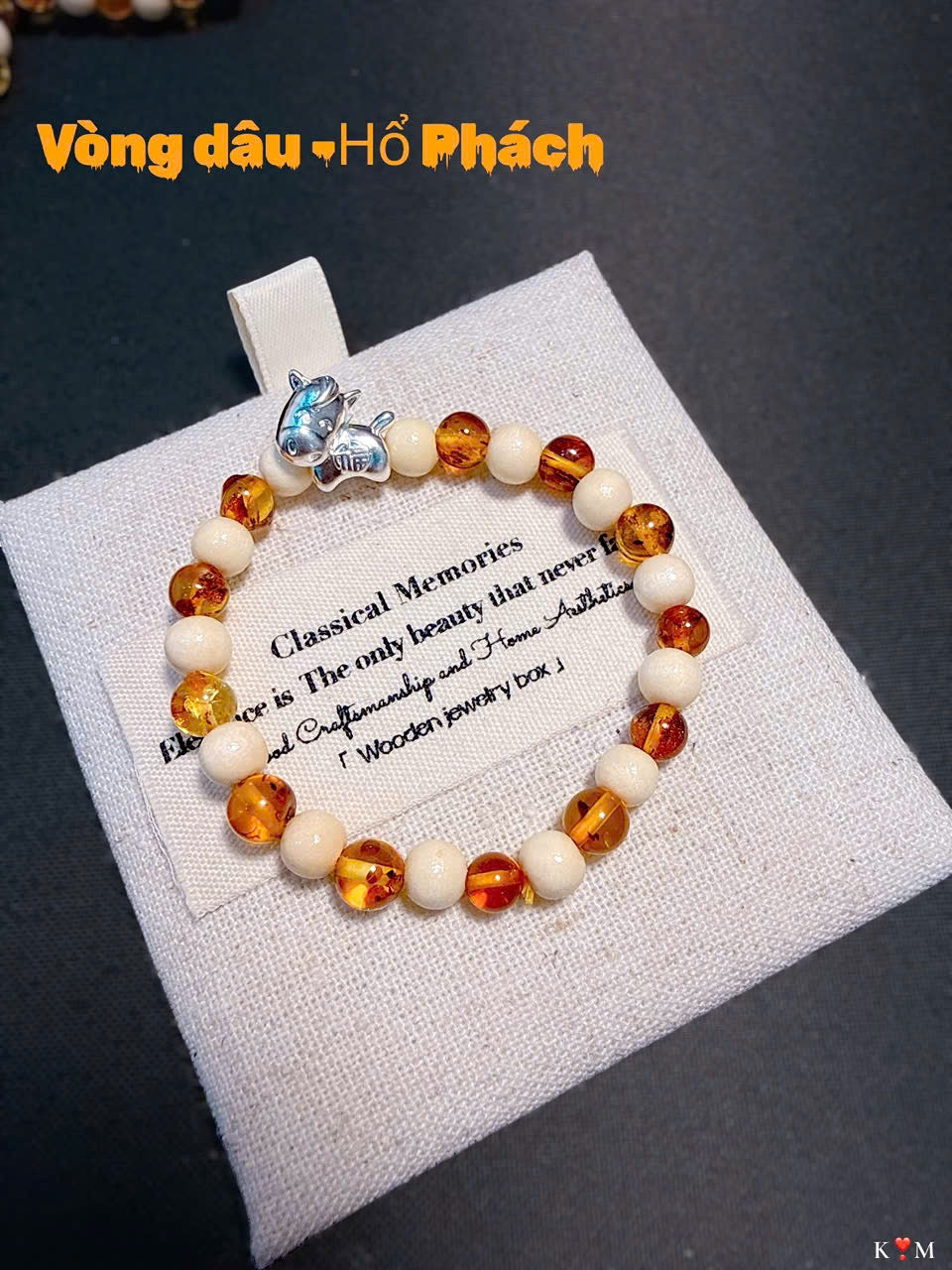 Vòng dâu mix hổ phách phối charm bạc