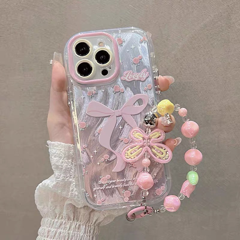 Ốp lưng IP nơ hồng kèm dây đeo tay