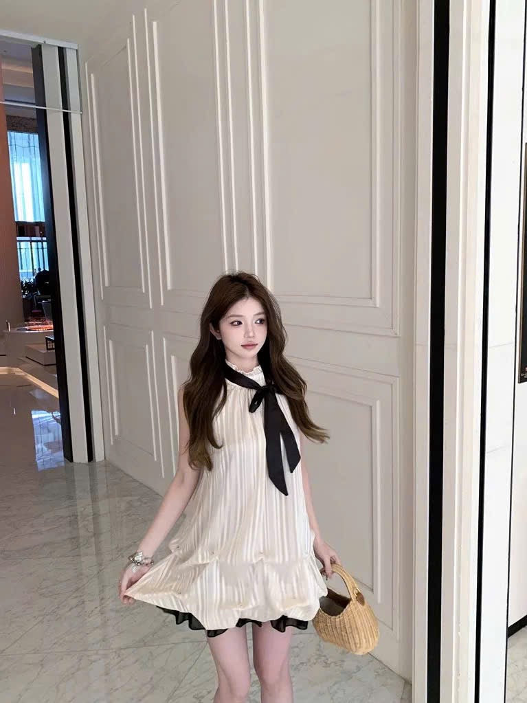 Váy yếm cột nơ tiểu thư