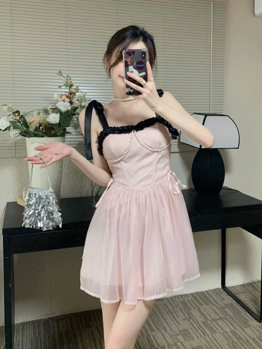 Váy 2 dây buộc nơ ngọt ngào