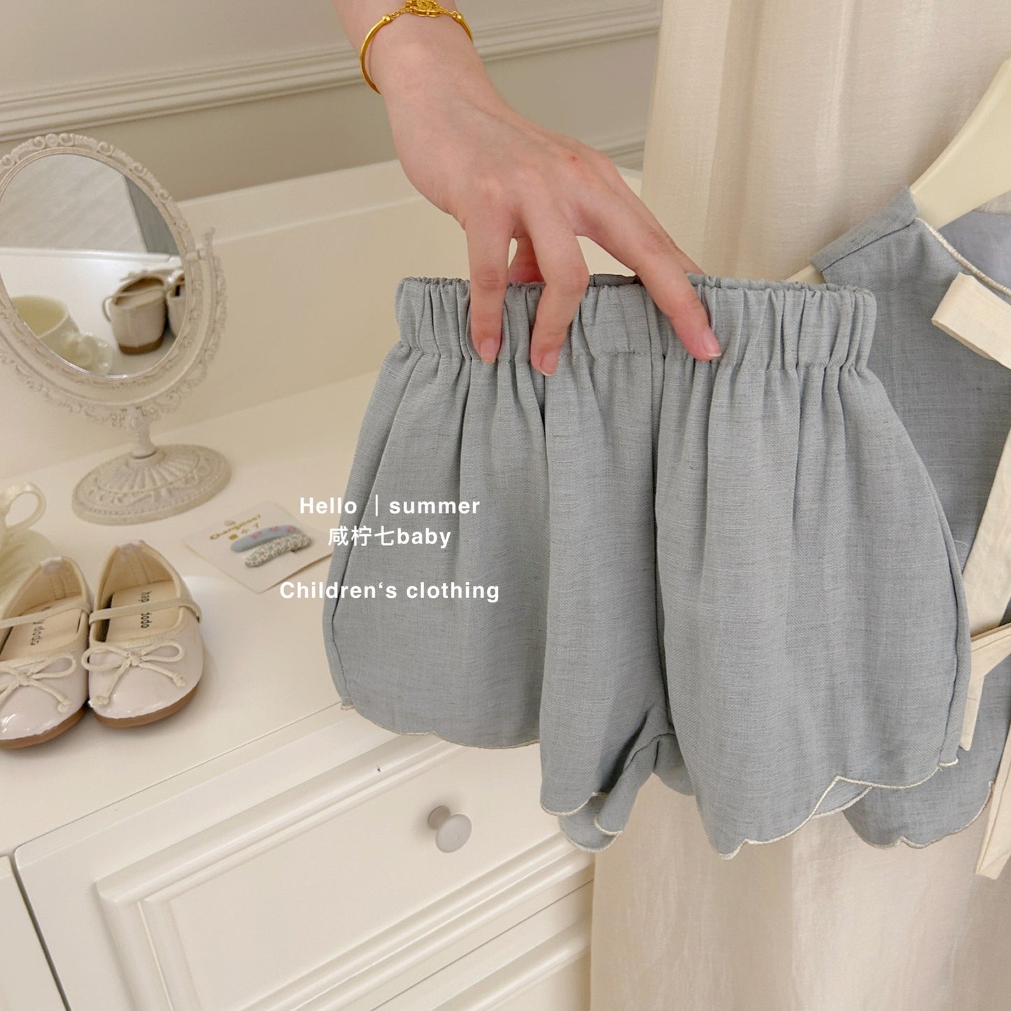Bộ đùi sát nách nơ xanh cho bé gái