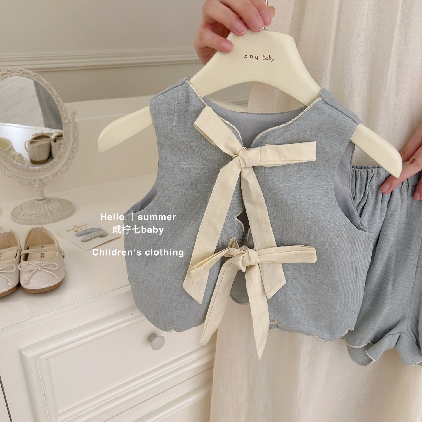 Bộ đùi sát nách nơ xanh cho bé gái