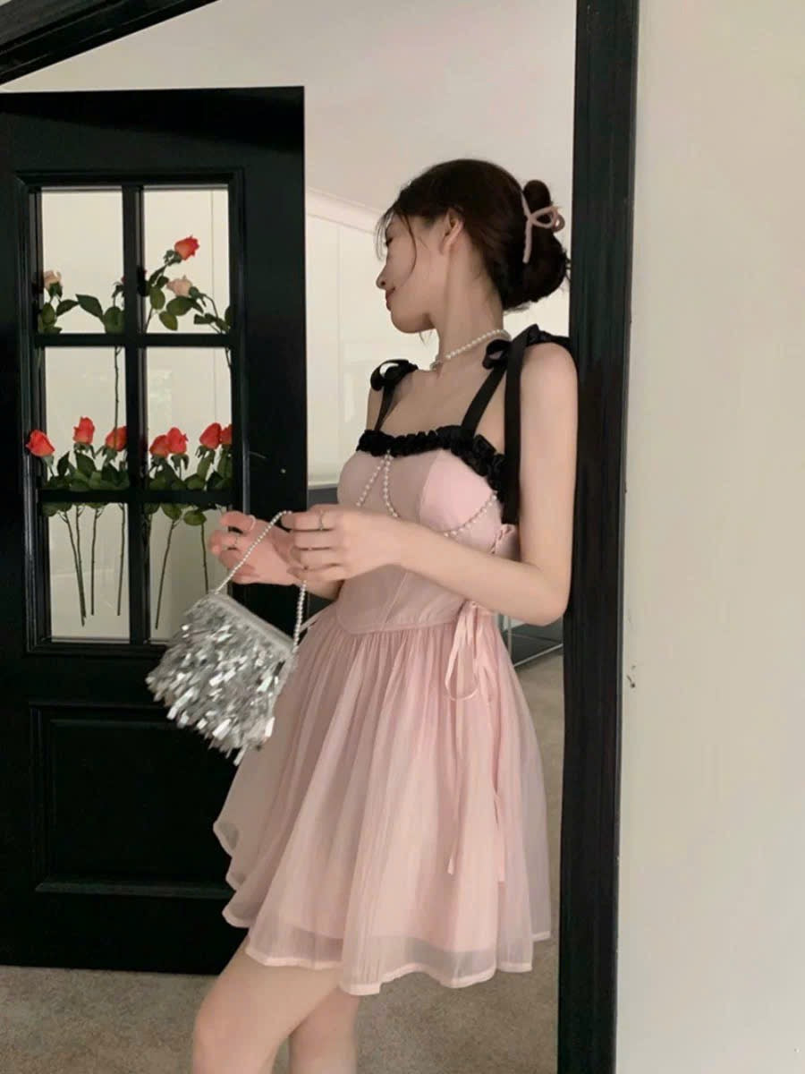 Váy 2 dây buộc nơ ngọt ngào