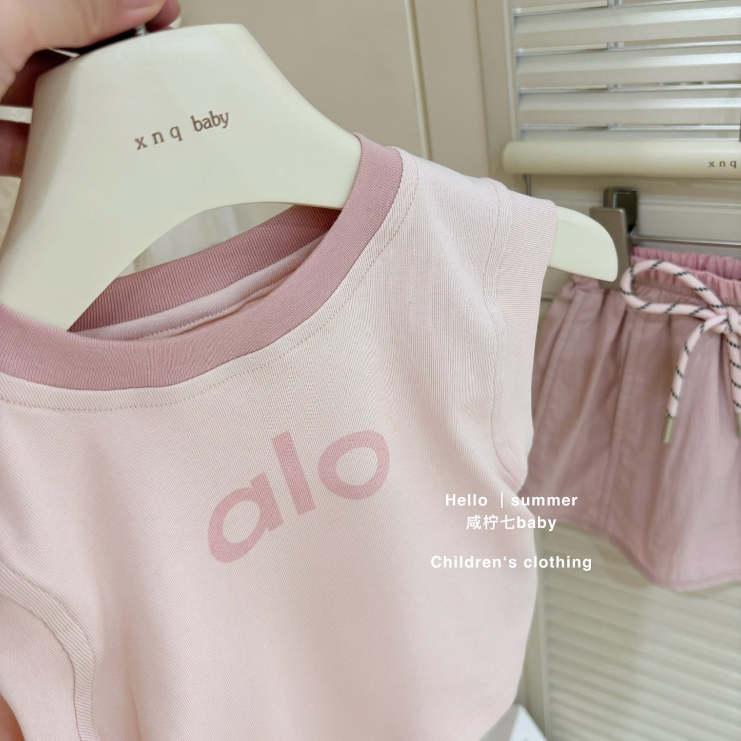 Áo ba lỗ váy hồng thể thao mát mẻ