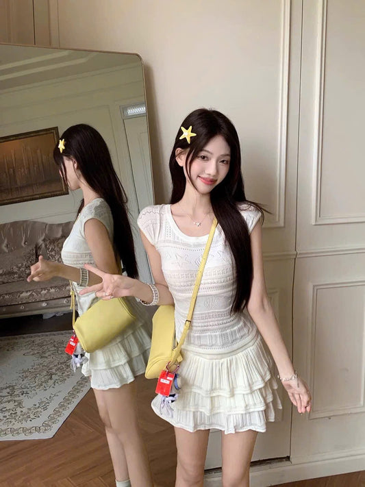 Set áo cổ tròn dệt kim phối chân váy tầng cạp cao