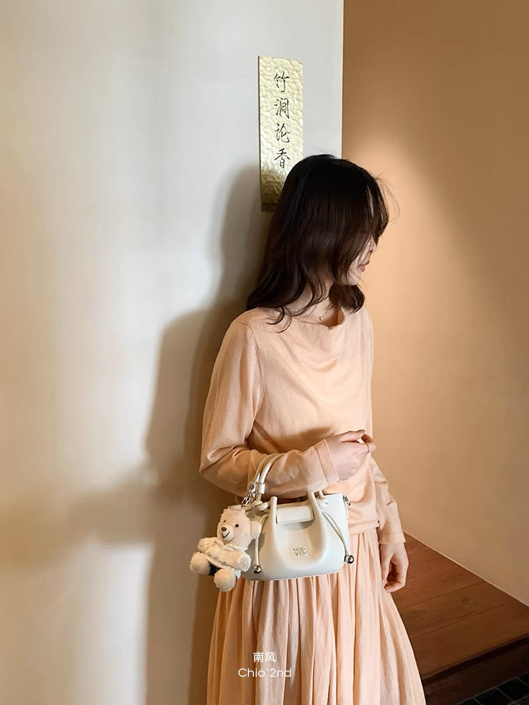 Túi trắng Chio’2nd charm gấu bông