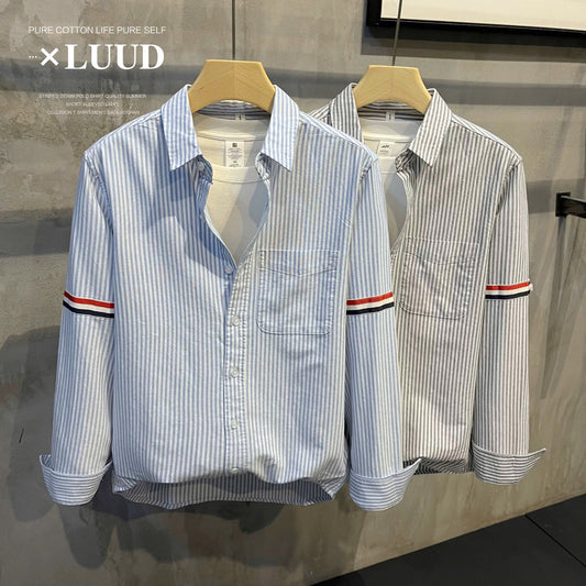 Sơ mi sọc xanh - xám tay phối màu