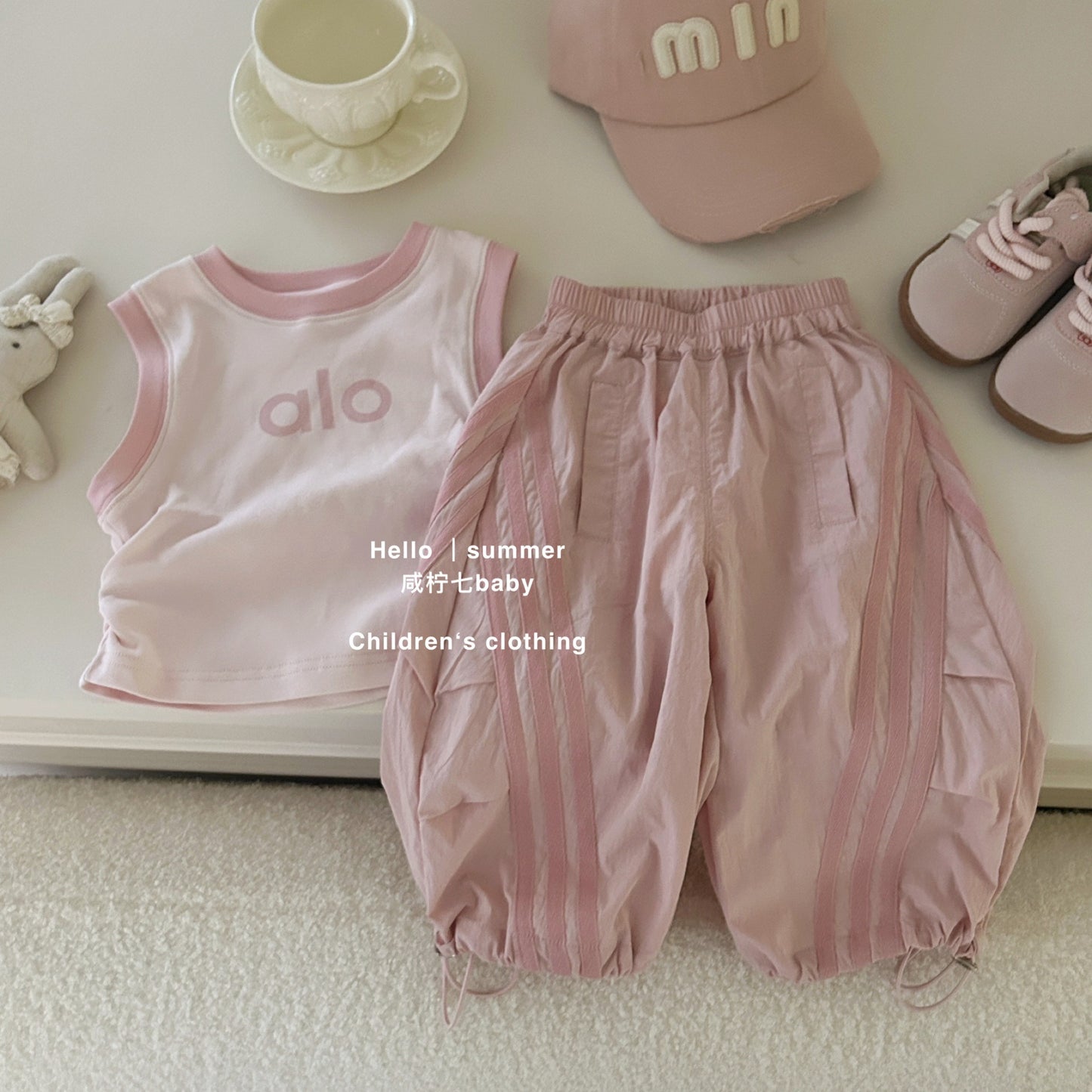 Set áo ba lỗ và quần dài hồng thể thao