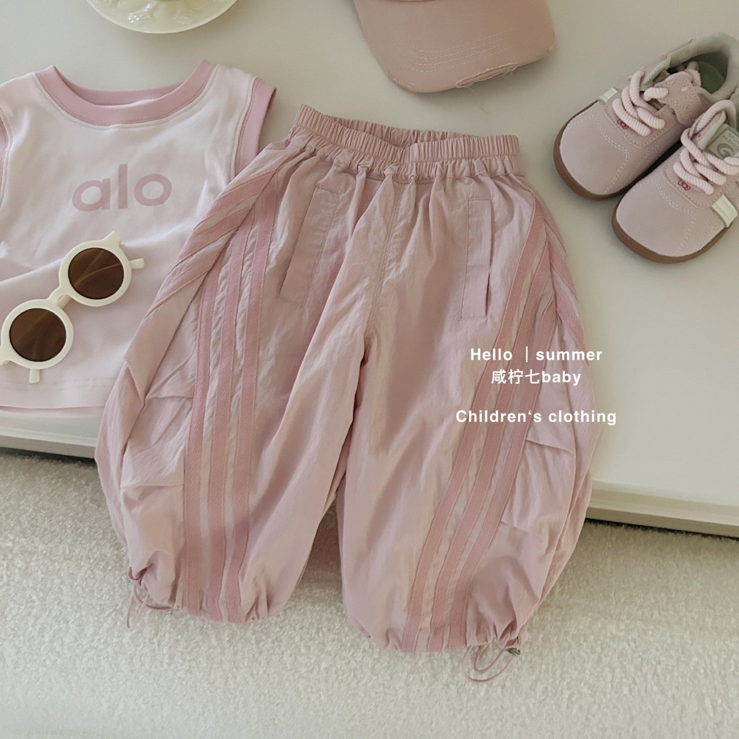 Set áo ba lỗ và quần dài hồng thể thao