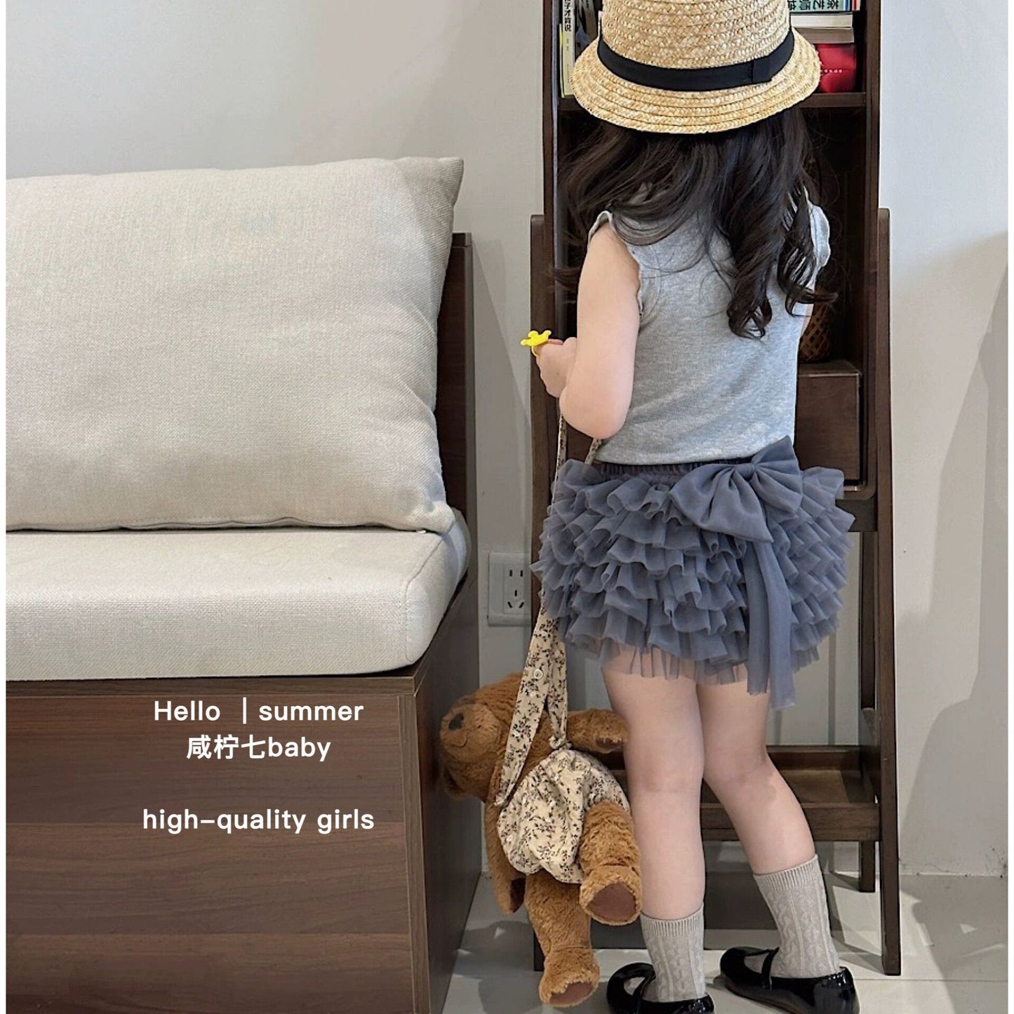 Set áo ba lỗ và chân váy nơ tầng xám cho bé gái