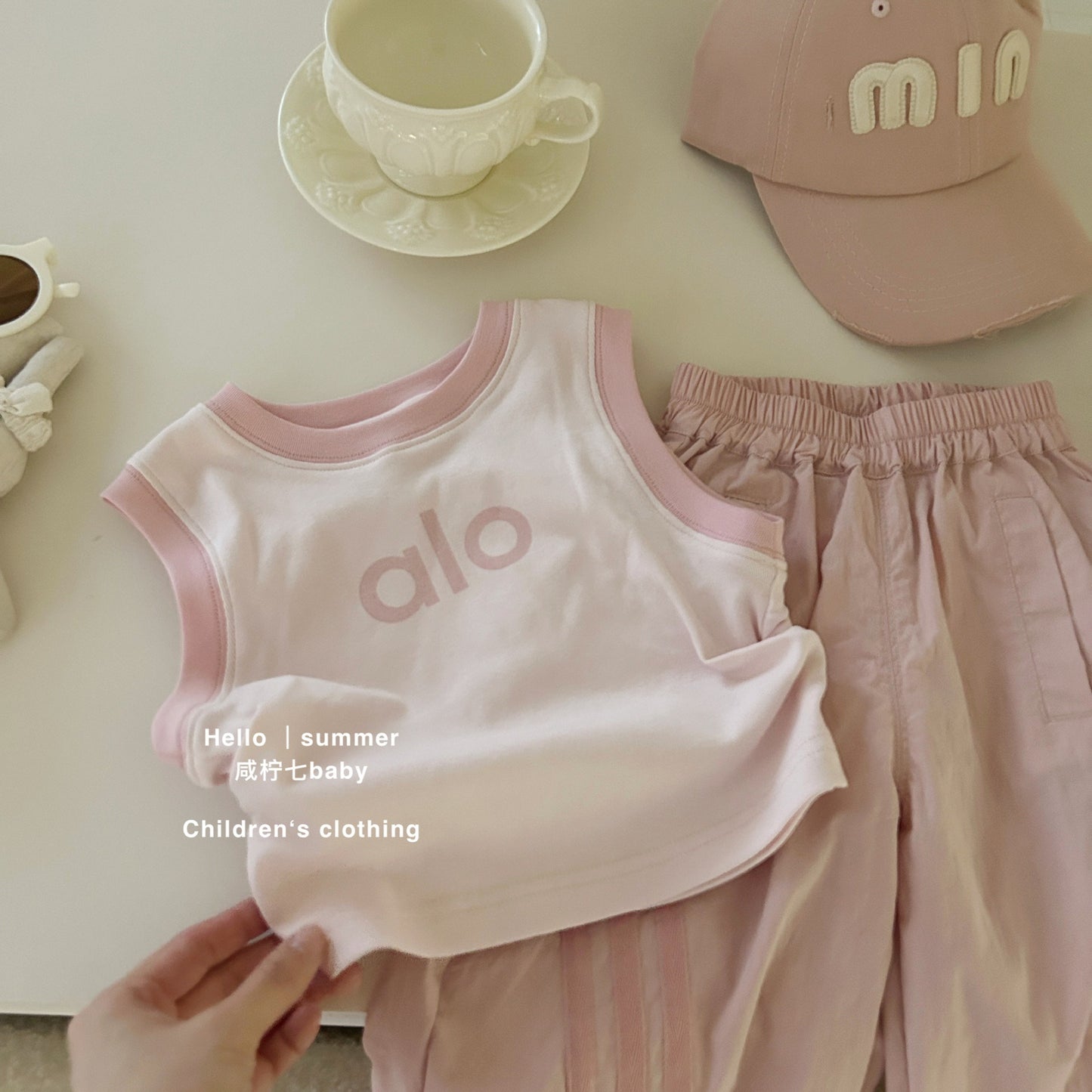 Set áo ba lỗ và quần dài hồng thể thao