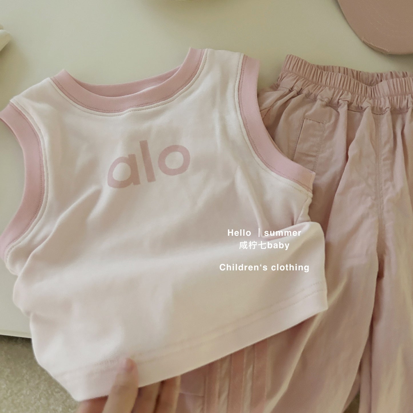 Set áo ba lỗ và quần dài hồng thể thao