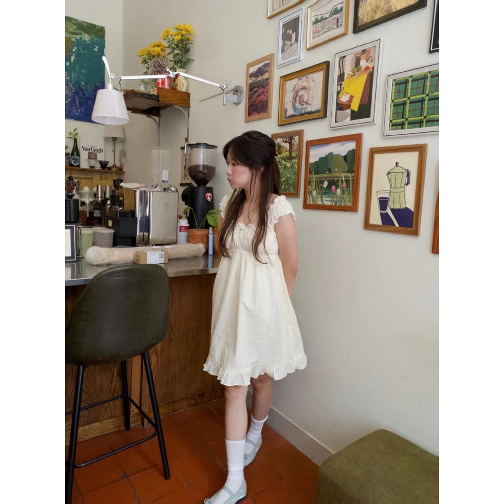Đầm babydoll trắng kem cổ vuông local brand Việt Nam