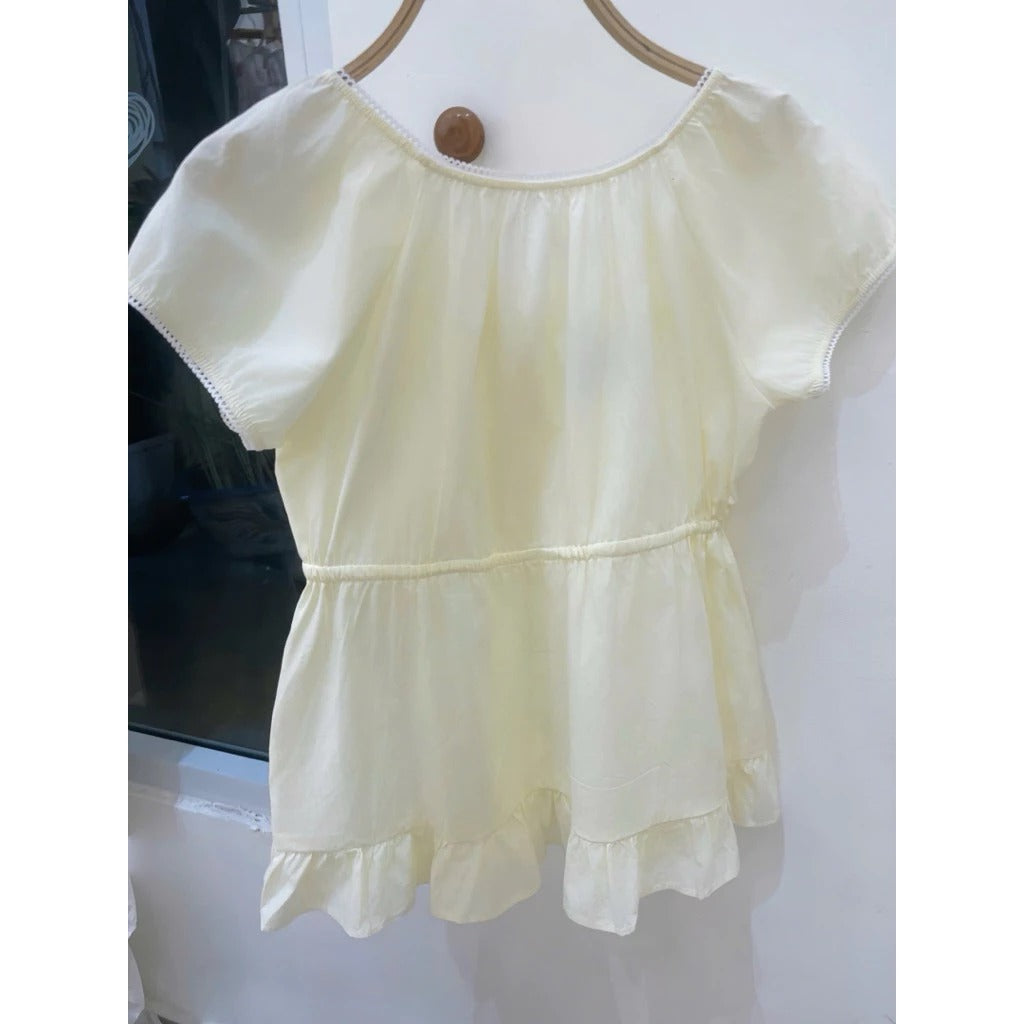 Áo babydoll vàng pastel phối ren cột nơ trước local brand Việt Nam