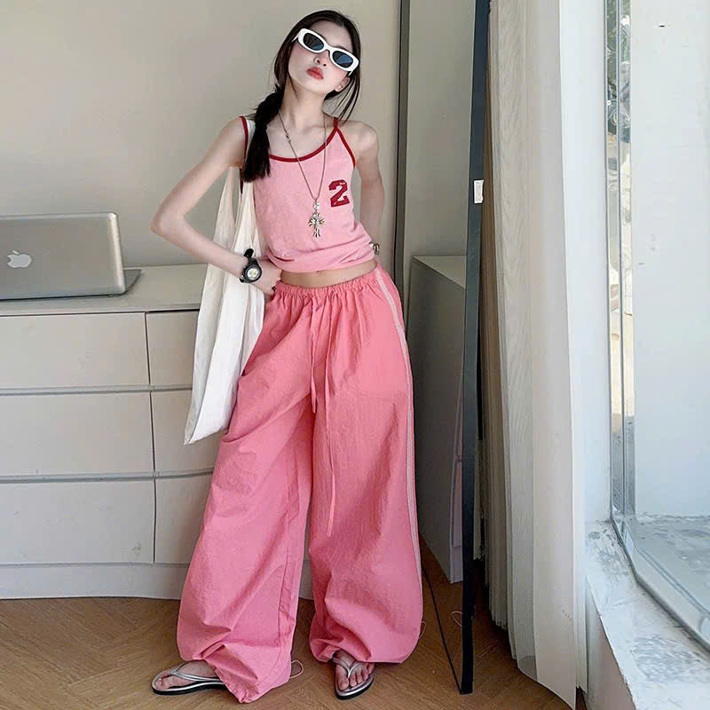 Set áo 2 dây hồng mix quần ống rộng dây rút thể thao