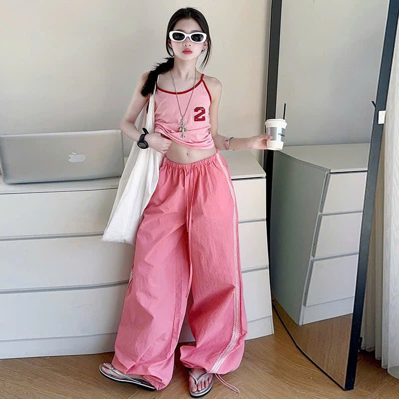 Set áo 2 dây hồng mix quần ống rộng dây rút thể thao
