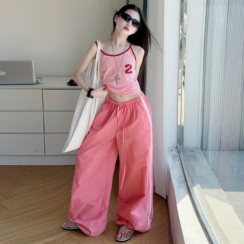 Set áo 2 dây hồng mix quần ống rộng dây rút thể thao