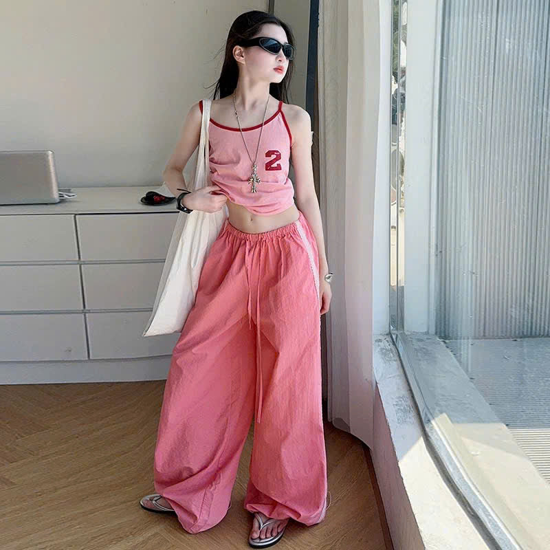 Set áo 2 dây hồng mix quần ống rộng dây rút thể thao