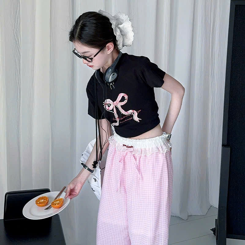 Áo phông nơ mix quần ống suông caro xanh hồng