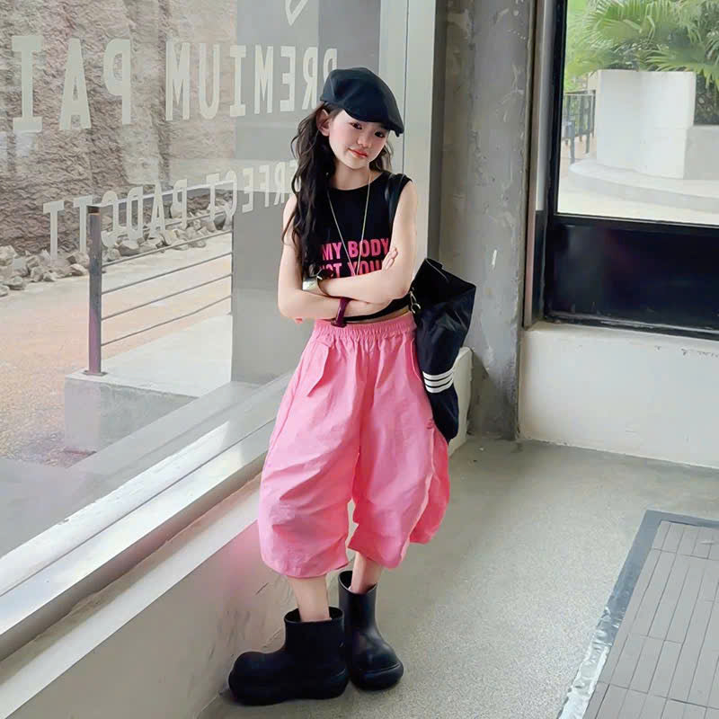 Áo ba lỗ phối quần ngố hot trend