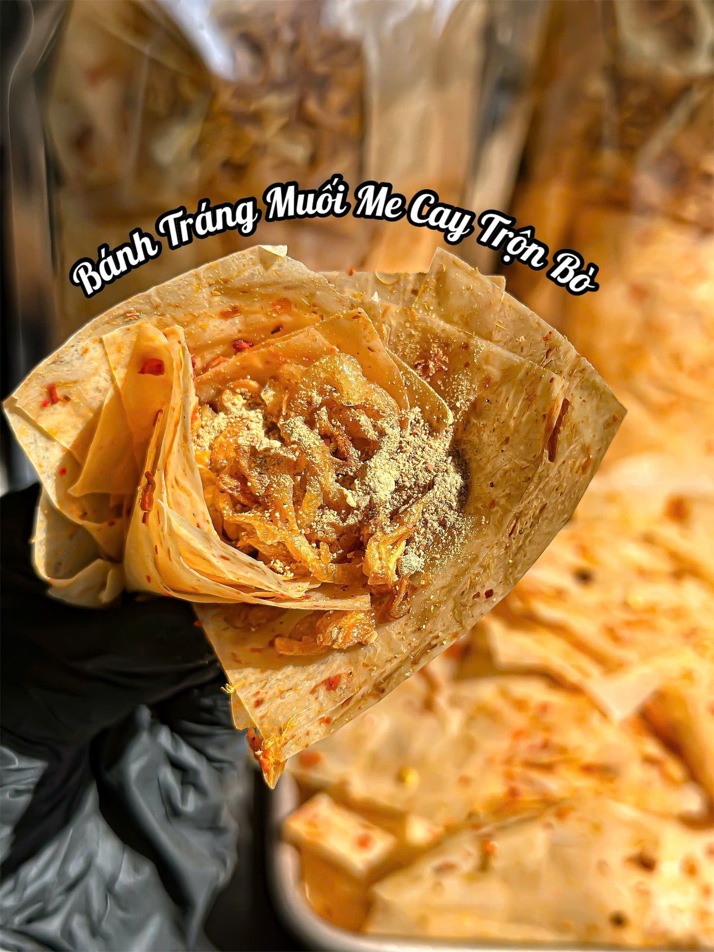 Bánh tráng muối me cay trộn bò
