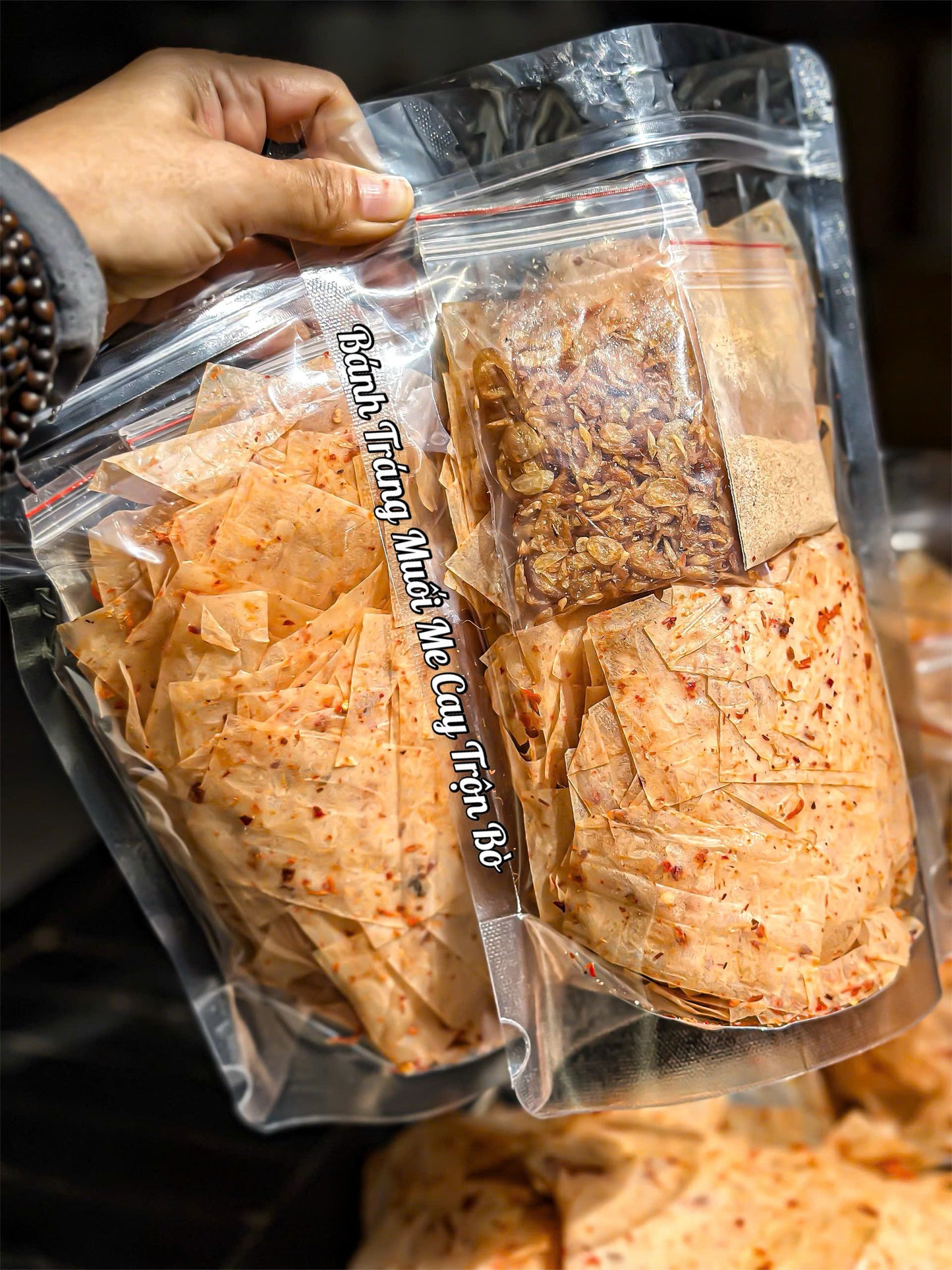 Bánh tráng muối me cay trộn bò