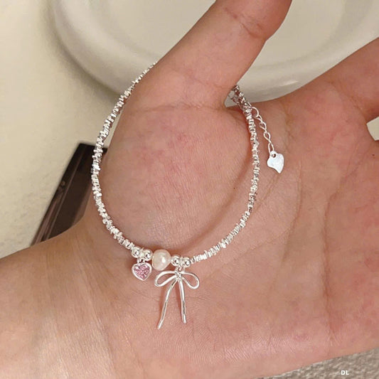 Lắc bạc lấp lánh & charm tim nơ nhỏ