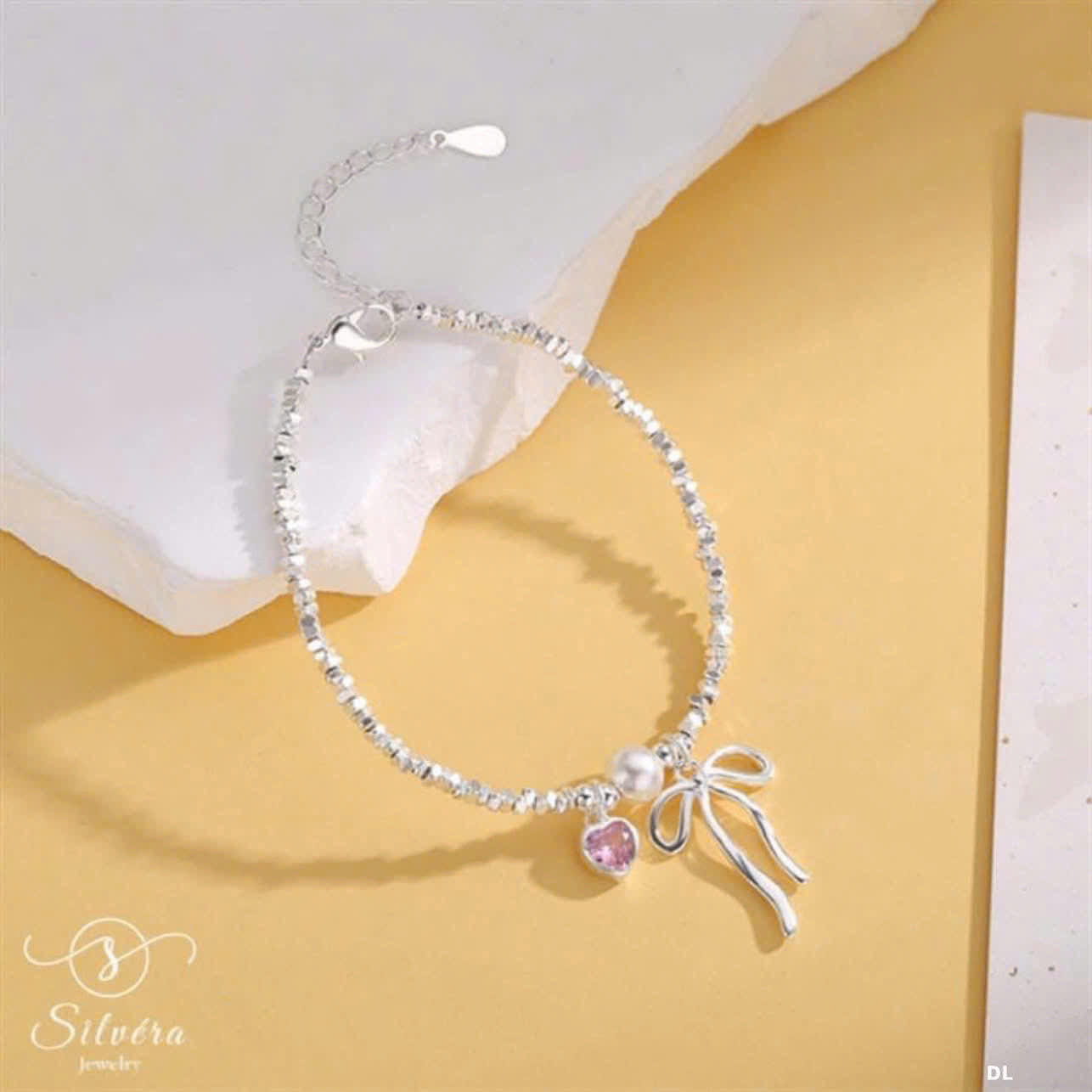 Lắc bạc lấp lánh & charm tim nơ nhỏ