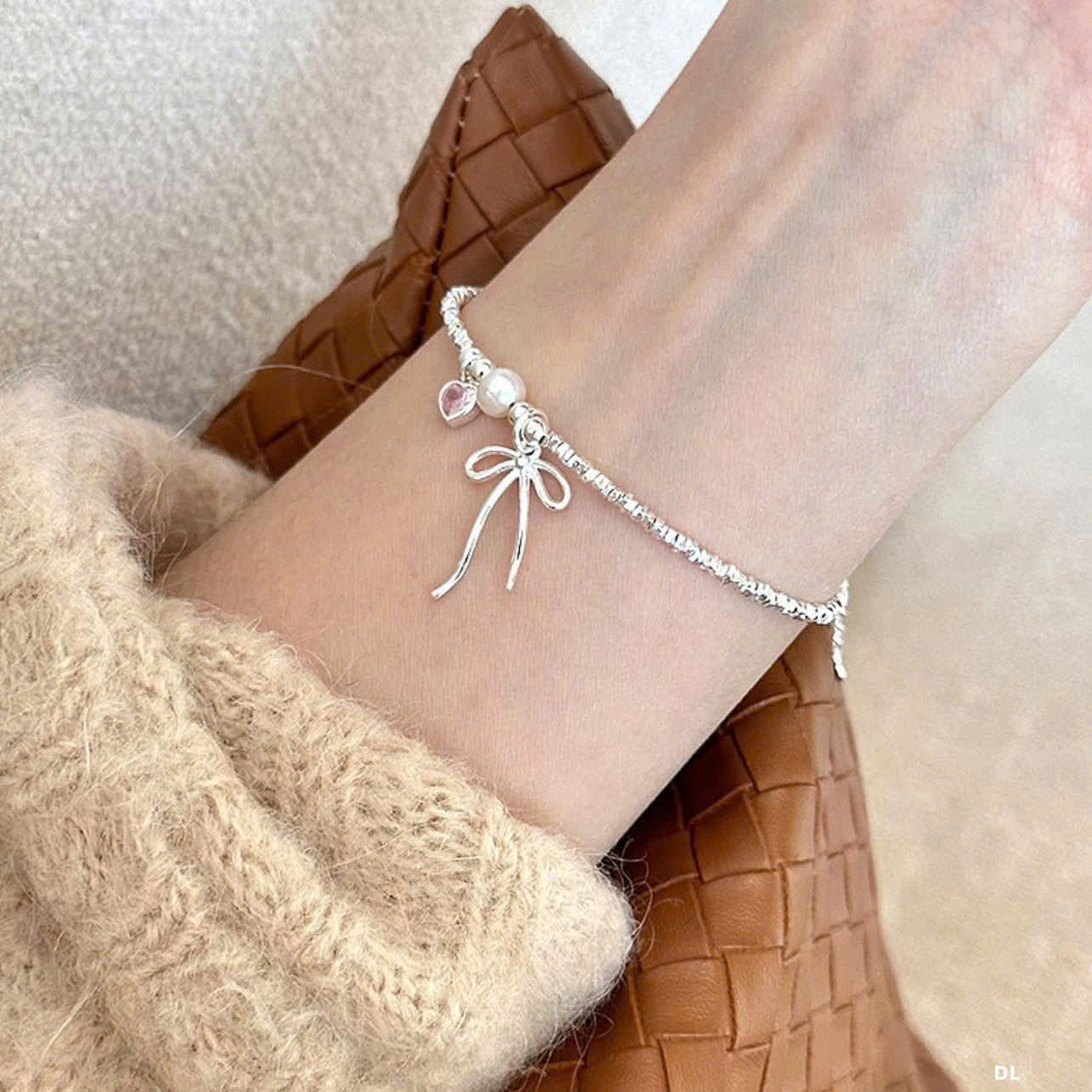 Lắc bạc lấp lánh & charm tim nơ nhỏ