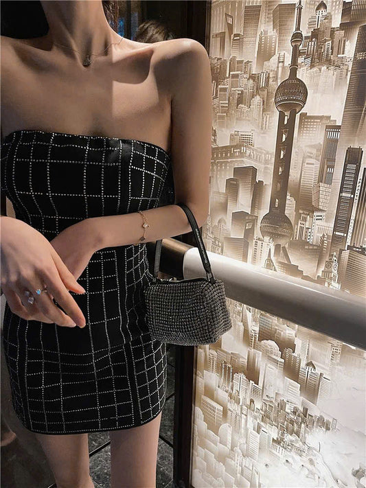 Đầm ống đen đính hạt bling bling