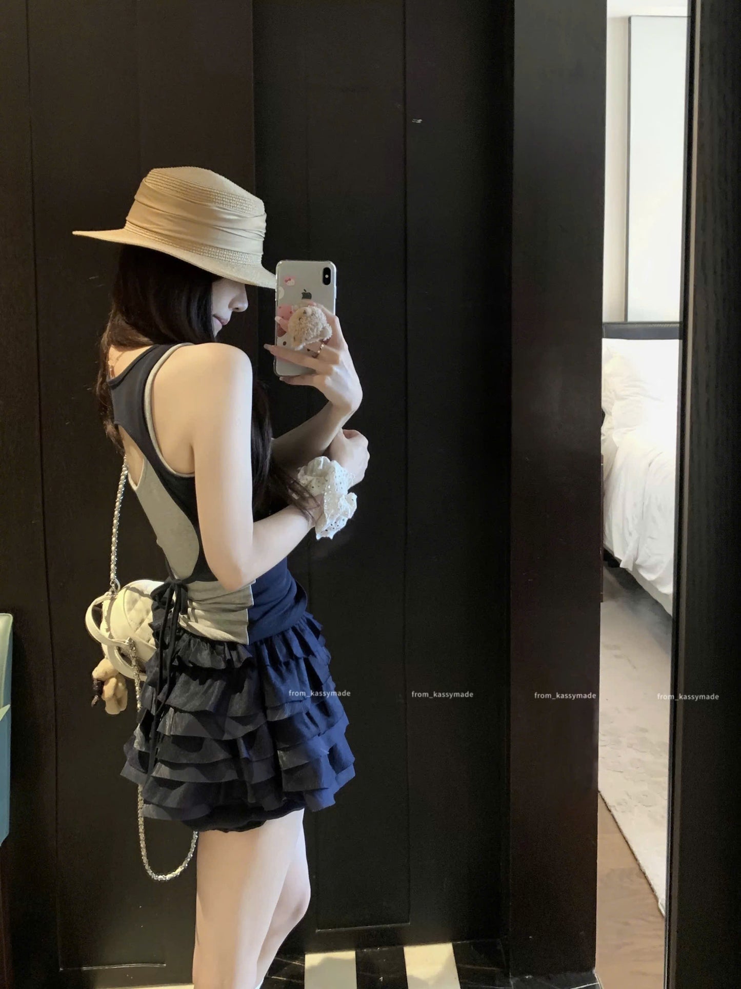 Set áo ba lỗ cột nơ lưng và chân váy tầng