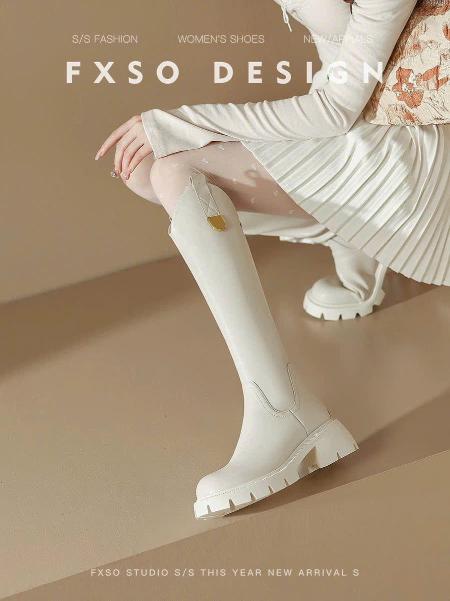 Giày boots đế cao da bóng tag vàng