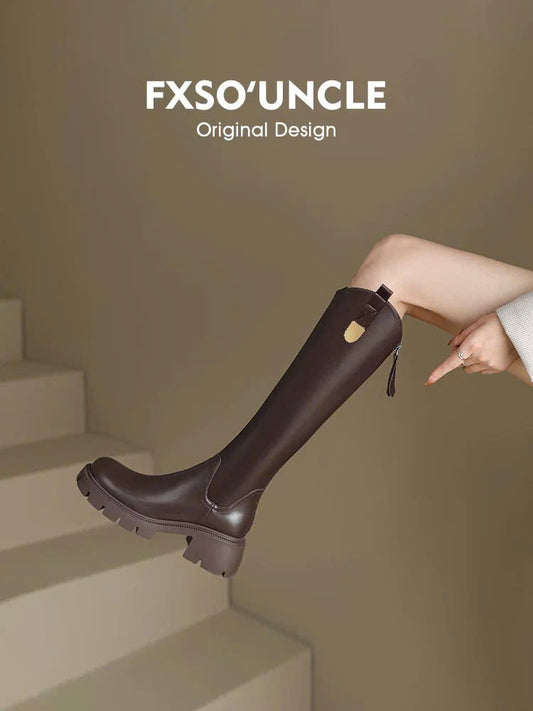 Giày boots đế cao da bóng tag vàng