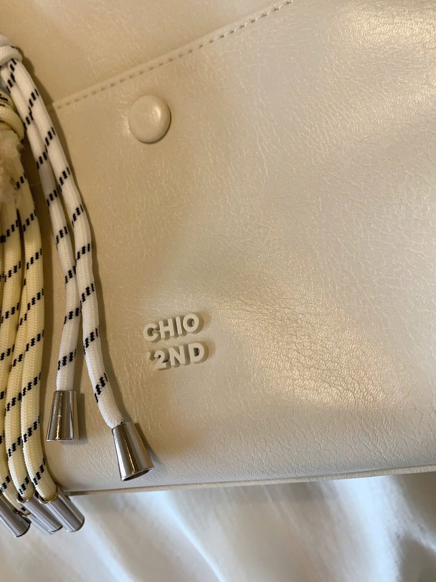 Túi da đeo vai Chio'2nd charm cún bông
