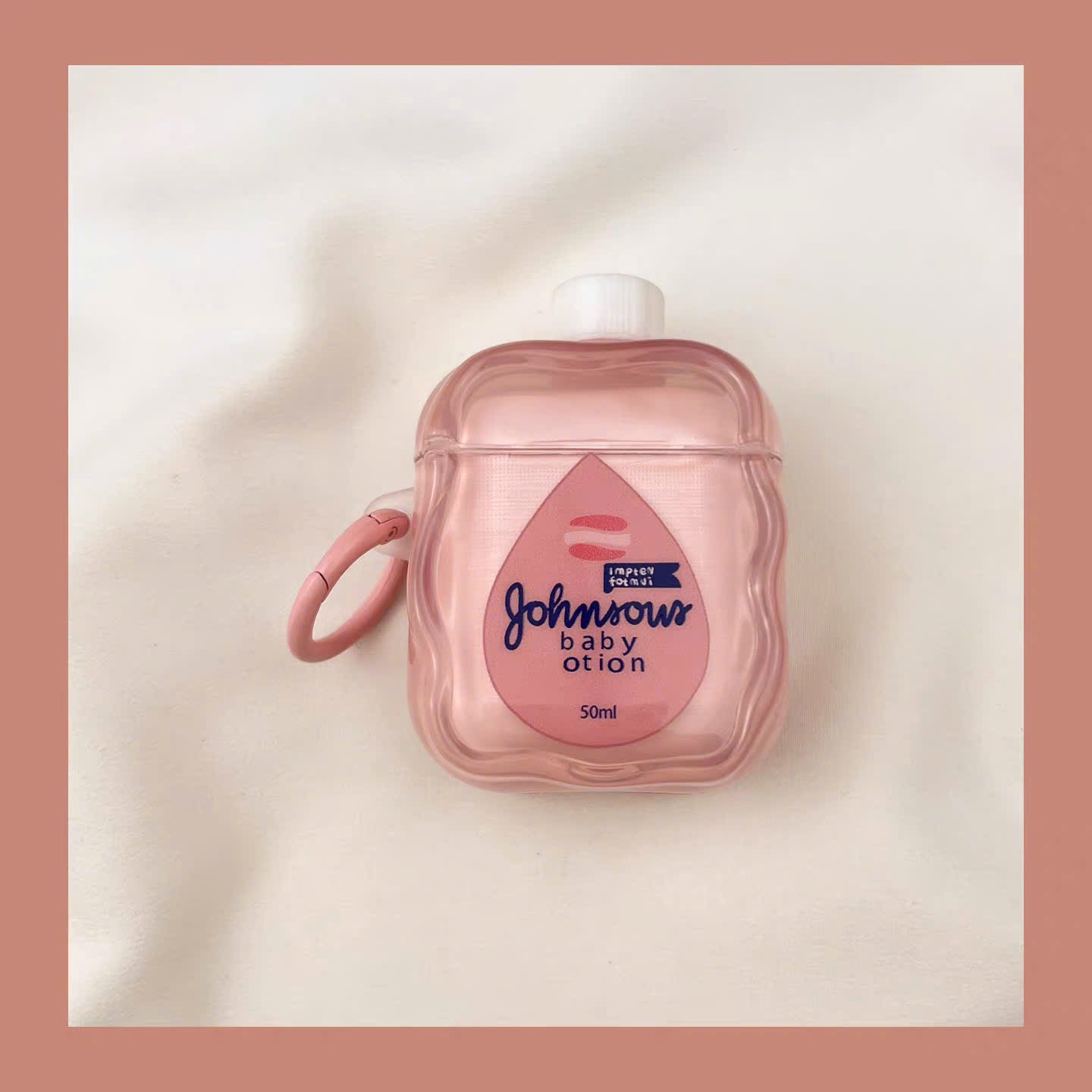Case Airpods lọ lotion em bé hồng