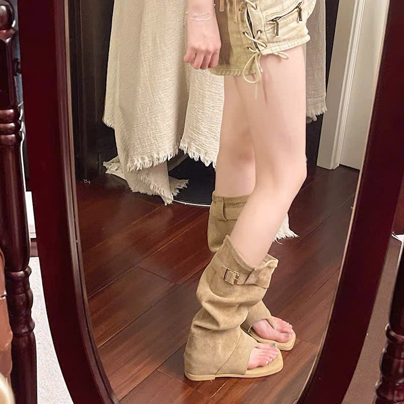 Boots xỏ ngón quai chéo đế cao