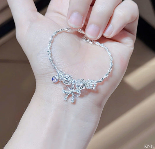 Lắc bạc phối charm sáng lấp lánh