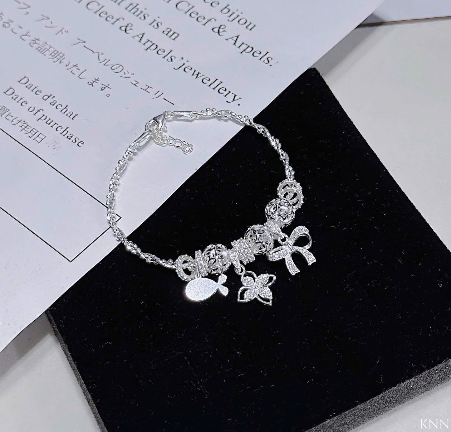 Lắc bạc phối charm sáng lấp lánh