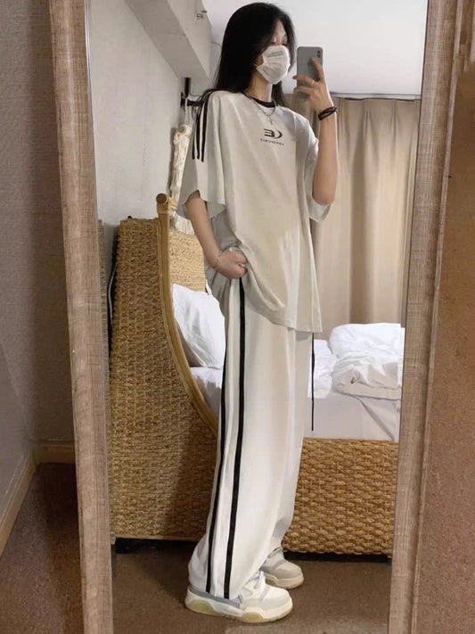 Bộ áo phông quần dài trắng kẻ sọc đen