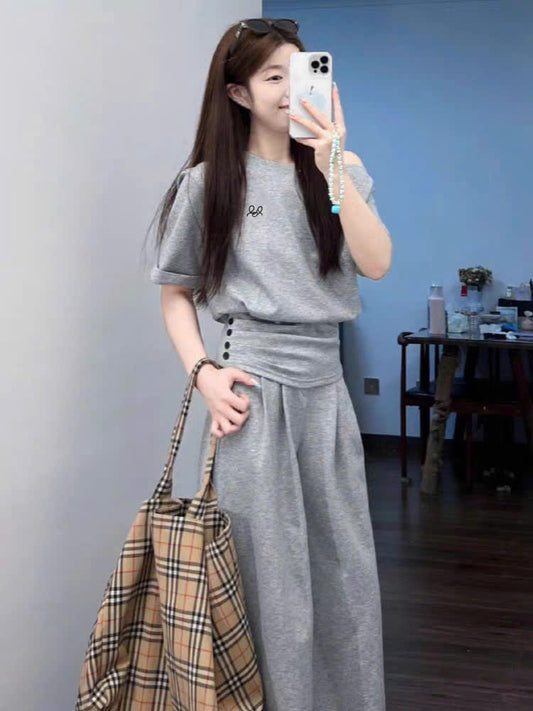 Bộ nỉ lệch vai ôm eo và quần ống rộng