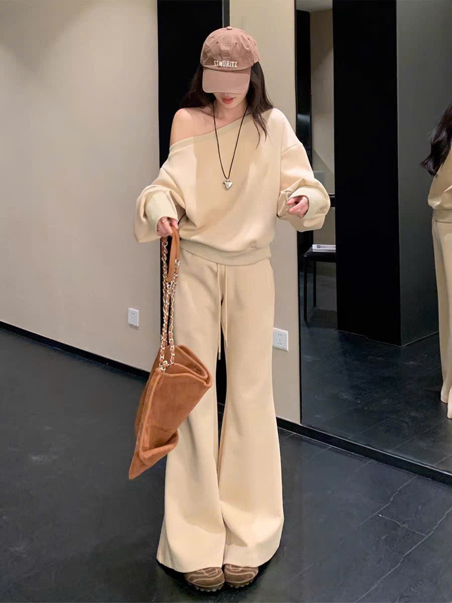 Set áo nỉ lệch vai và quần ống loe tôn dáng