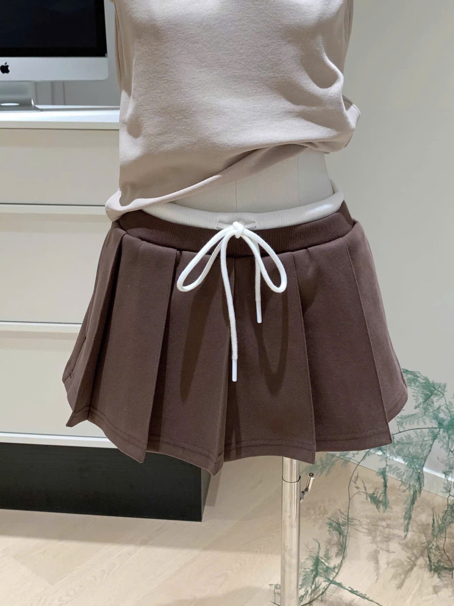 Chân váy ngắn xếp ly to dây rút