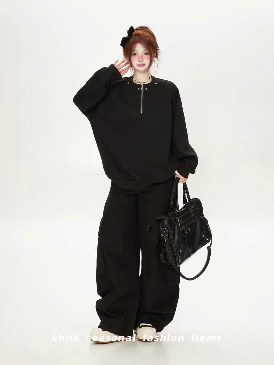 Áo sweater đen cổ khóa kéo